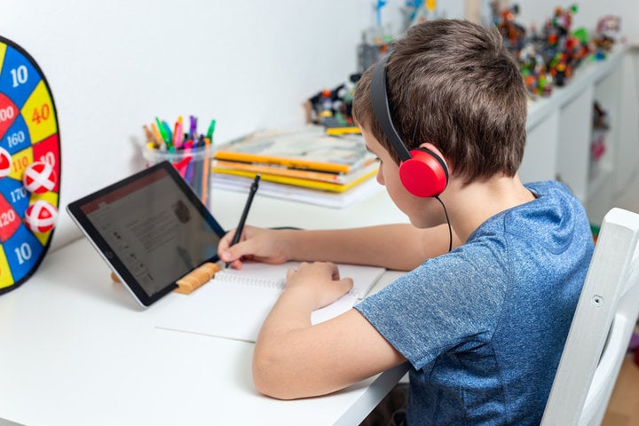 Boy learning at desk