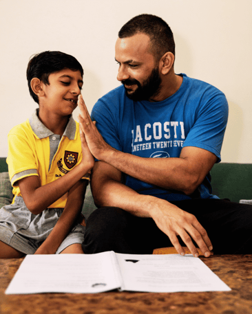 Father teaching son